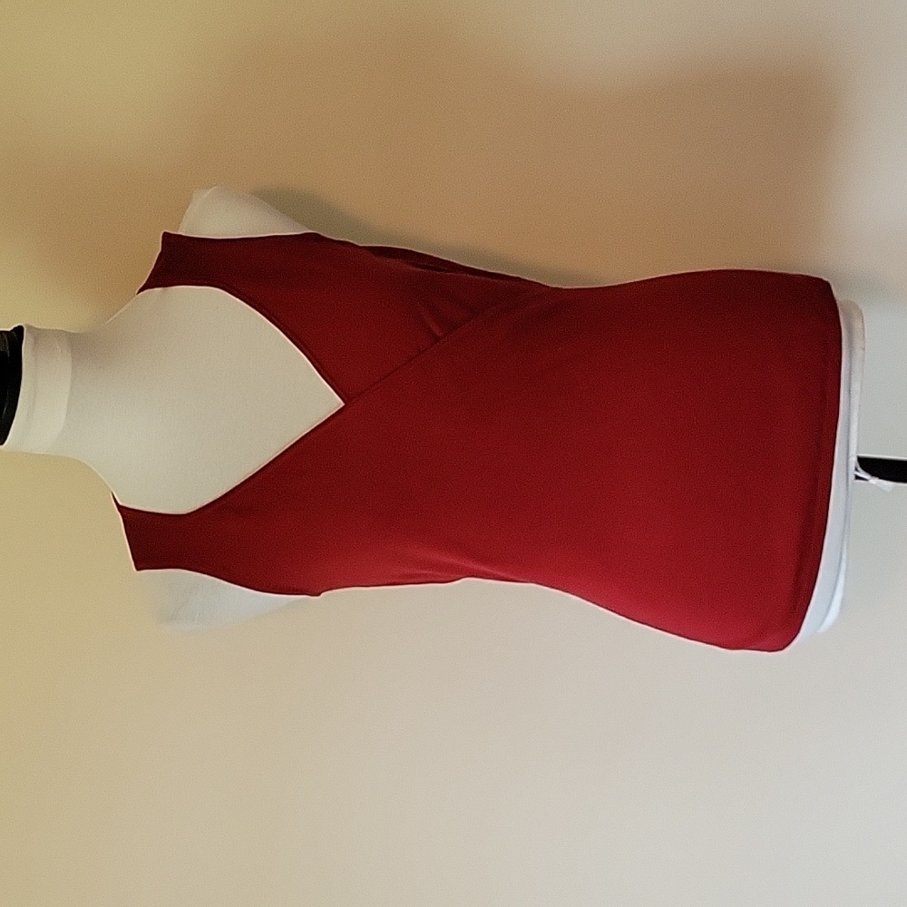 Ann Taylor small sleeveless cross front vest in rich brick red. Excellent condit